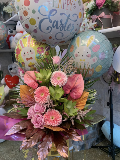 floral fantasies - This arrangement is made in floral foam, so needs no maintenance. it is made with fresh flowers, dried flowers and decretive foliage.