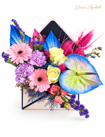 perfect pastels - This envelope design is made in floral foam, and a mixture of fresh flowers have been used, these pastel flowers are perfect for any occasion.