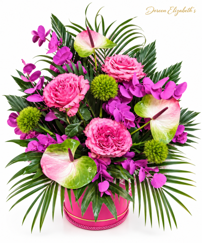 mini tropical - This arrangement is made in floral foam, it contains exotic flowers such as anthurium, celosia and other fresh flowers including gerbera and roses.