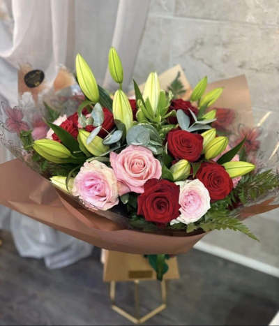 Sweet Romance - A bouquet of mixed beautiful roses is sure to create a lasting impression.
