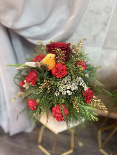 robins and roses - a tin containing seasonal foliage & luxurious flowers such as roses, dianthus, hypericum, wax flower and solidago